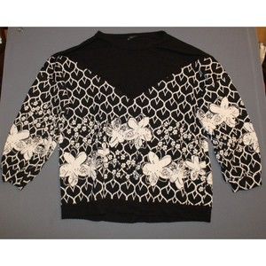 Storyteller brand Women’s Plus Size 1X  Black with white floral pattern Sweater